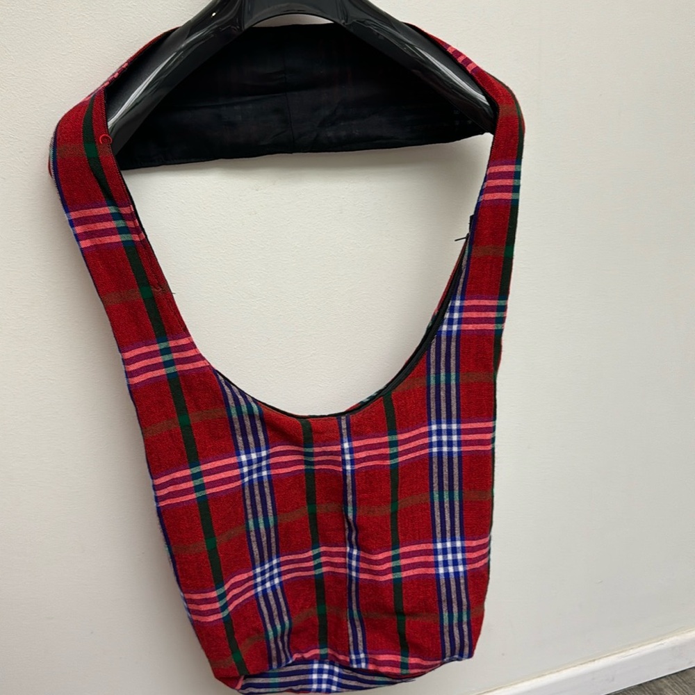 Side sling travel bag plaid print zip top for security
